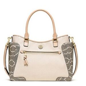 Tory Burch top handle bag with adjustable cross body strap.